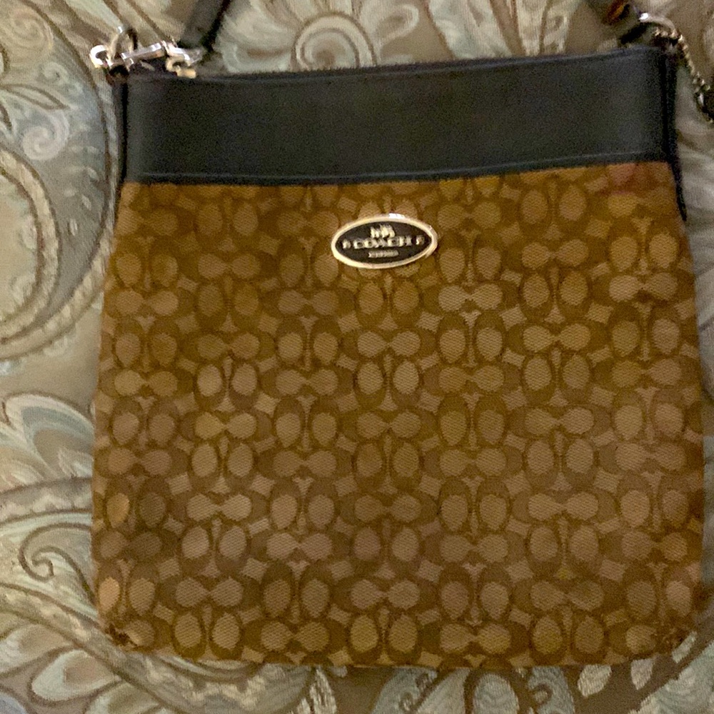 Coach shoulder strapped cross body  pouch.